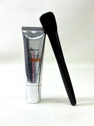 Temporary Eye Tightener tube with black applicator brush beside it.